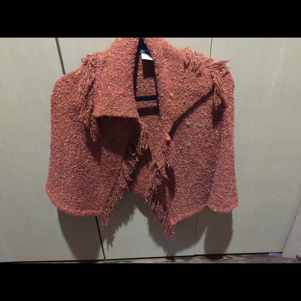 Gorgeous knit shawl with fringe.